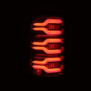 AlphaRex 19-21 Dodge Ram 1500 Luxx-Series LED Tail Lights Alpha-Black w/Activ Light/Seq Signal